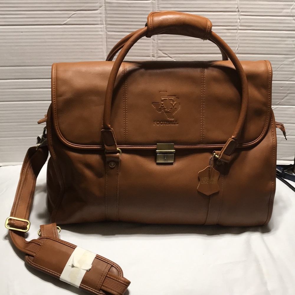 Texas A& M football leather weekender with multi compartments and padded. New!